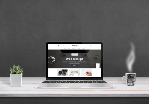 Image of a computer showing web design